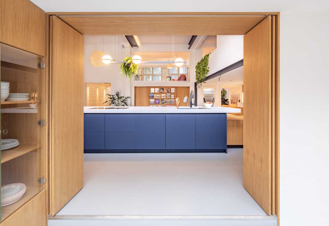 view towards the funky kitchen of an urban loft in Amsterdam By Standard Studio